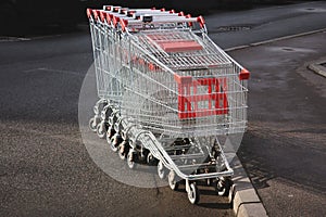 Parked metal shopping carts