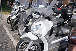 Parked motor scooters