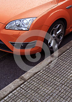 Parked orange sports car