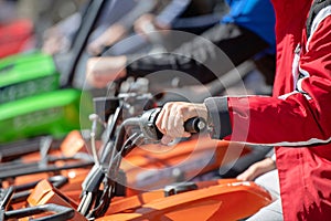 Parked in a row several atv quad bikes extreme outdoor adventure concept