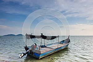 Parked Sampan on a calm sea