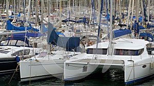 Parked Ships, Boats, Yachts in the Port Vell of Barcelona, Spain.