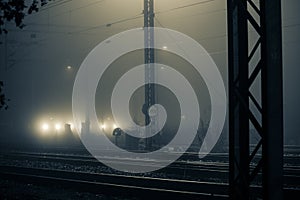 Parked Train at Foggy Midnight