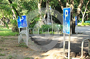 Parking bicycle in public park.