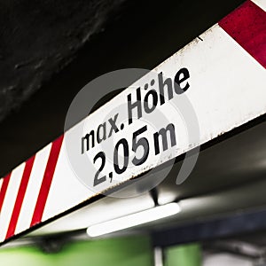 Parking garage warning sign maximum height