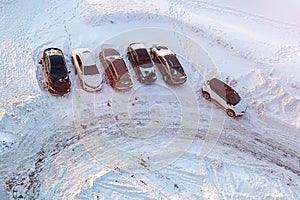Parking lot for cars in winter snowy season