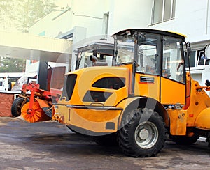 At the parking lot of garbage trucks, tractors