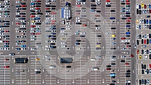 Parking lot with many cars aerial top drone view from above, city transportation