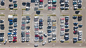 Parking lot with many cars aerial top drone view from above, city transportation