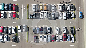 Parking lot with many cars aerial top drone view from above, city transportation