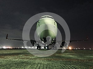 PARKING PLANE AT NIGHT