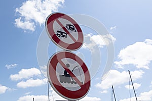 Parking prohibited for caravan motorhome van tourer and fish fishing with signage red round sign