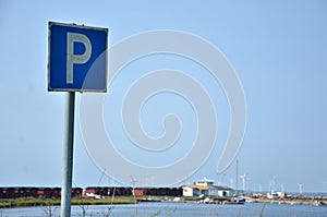 Parking sign on a background inoperative at this time of year, a small port photo