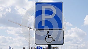 Parking sign for a disabled persons on the mall parking