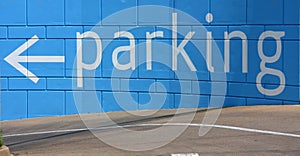 Parking sign at the entrance of garage