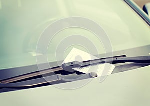 Parking ticket on car windscreen
