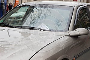 Parking Ticket placed under the wiper blade on the windscreen of an illegally parked car