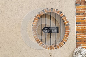 Parking visiteurs sign on Epernay wall