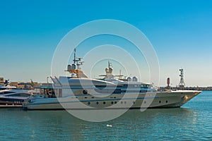 Parking yachts and boats in the seaport.