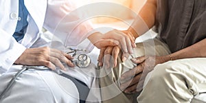 Parkinson`s disease patient, Arthritis hand and knee pain or mental health care concept with geriatric doctor consulting examining