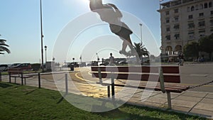 Parkour in the City. Tracer Jumping over the Bench