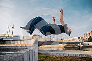 Parkour man doing tricks in the air