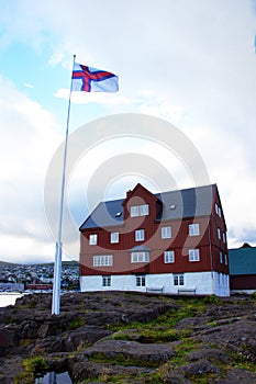 Parlement and flag of Torshavn on Faroe Islands photo