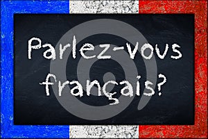 Parlez-vous francais blackboard with franceh flag frame