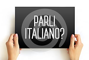 Parli Italiano? do you speak Italian? text on card, concept background