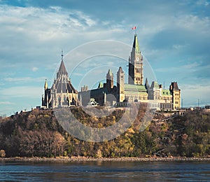 Parliament Hill overlooking the Ottawa River in Ottawa, Ontario photo