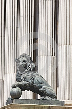 Parliament facade columns and lion in Madrid, Spain. Congreso