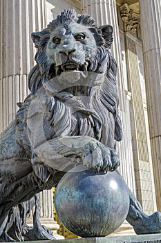 Parliament facade columns and lion in Madrid, Spain. Congreso diputados photo