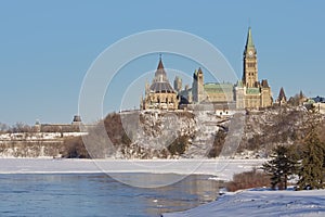 Parliament hill along frozen Ottawa river