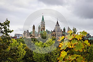 Parliament Hill, Ottawa, Rideau canal. Cloudy sky in Autumn city.