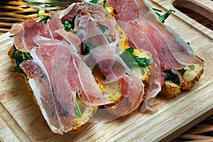 Parma ham (jamon) traditional Italian meat specialties photo