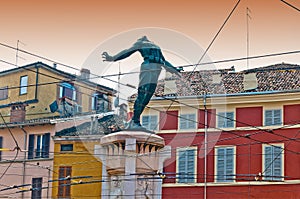 Parma, Italy - colorful Mediterranean architecture and monument to soldier