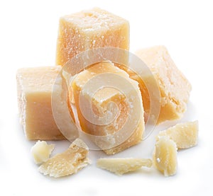 Parmesan cheese cubes isolated on white background photo