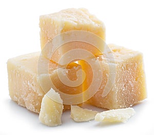 Parmesan cheese cubes isolated on white background photo