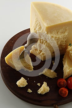 Parmesan cheese with knife