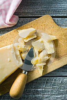 Parmesan cheese with knife