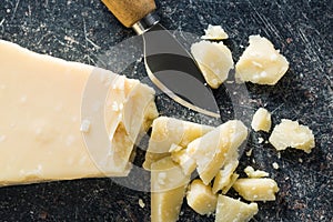 Parmesan cheese with knife