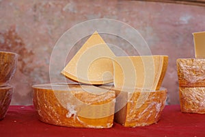 Parmesan Parmigiano Italian Cheese on sale in a Market Store