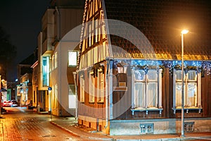 Parnu, Estonia. Night View Of Corner Of Uus And Nikolai Streets With Old Houses In Evening Night Illuminations