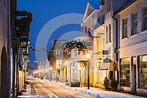 Parnu, Estonia. Night View Of Famous Ruutli Street With Old Buildings, Restaurants, Cafe, Hotels And Shops In Festive