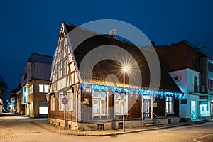 Parnu, Estonia. Night View Of Old Wooden Parnu Citizen s House At Nikolai Street In Evening Night Illuminations