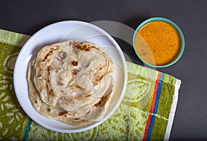 Parotta and Chicken Curry Dish