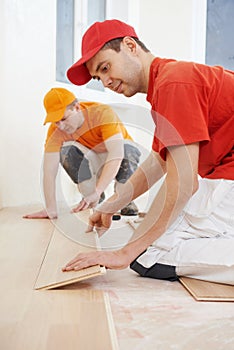 Parquet workers at flooring work
