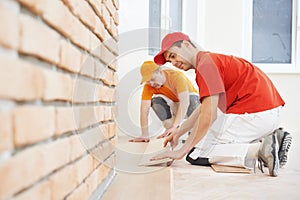 Parquet workers at flooring work