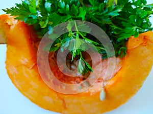 Parsely and pumpkin on a white background