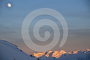Parsenn mountain swiss alps panorama in winter sunset photo